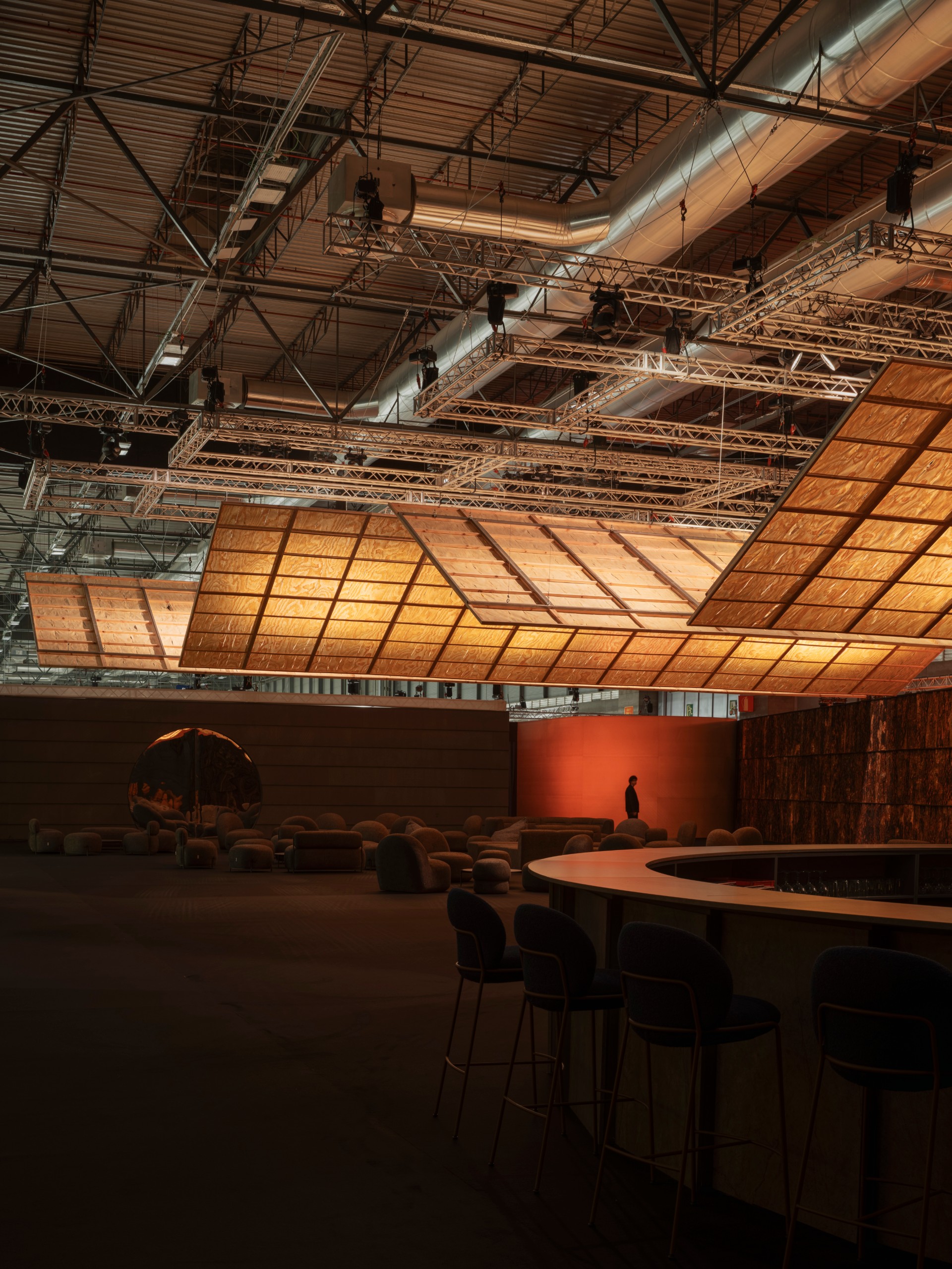 The curved counter of the bar beneath the glowing planes