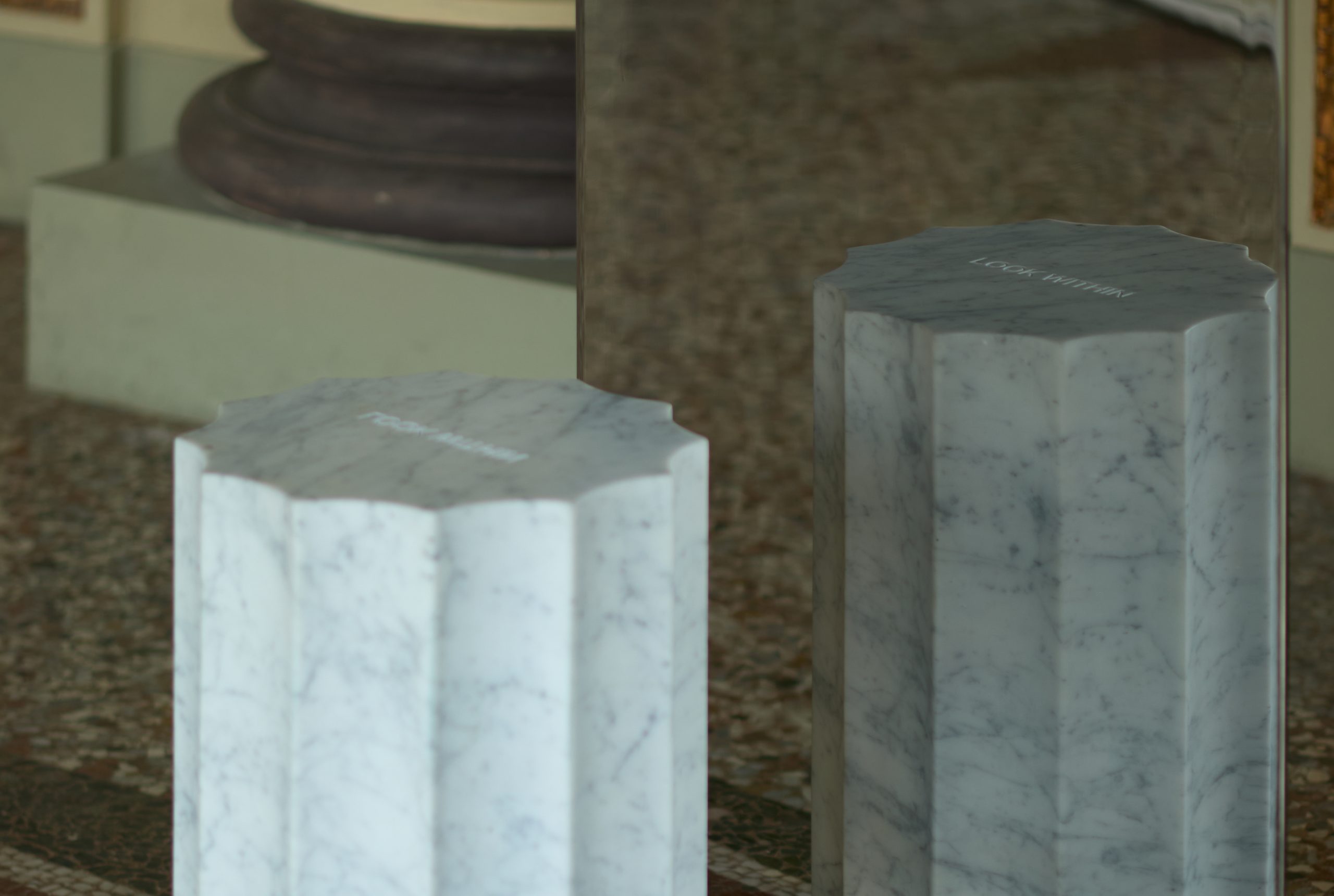 Close view of the marble elements and reflective stainless steel