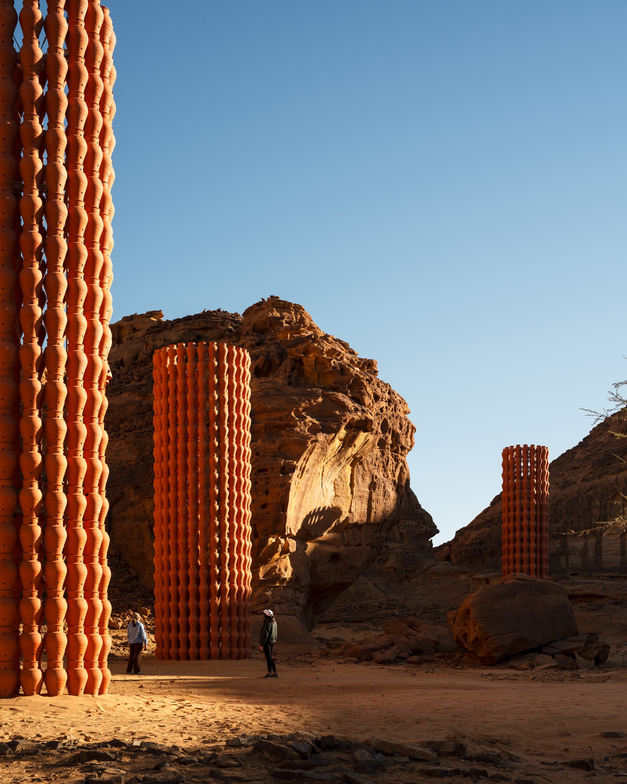 A closer view brings the stacked vessels and their geometric openings into focus.