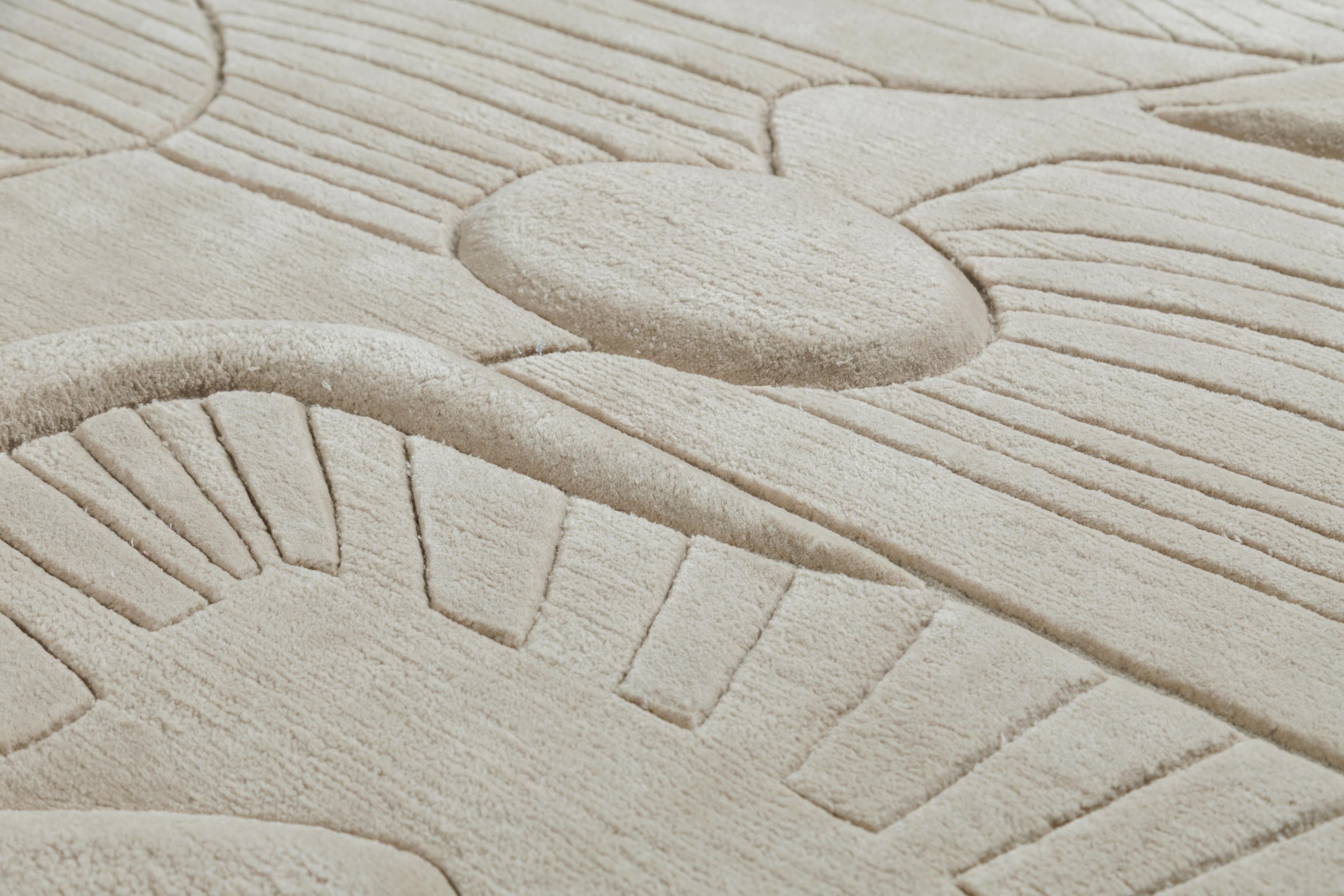Carved cream rug surface from the Art+Loom collection