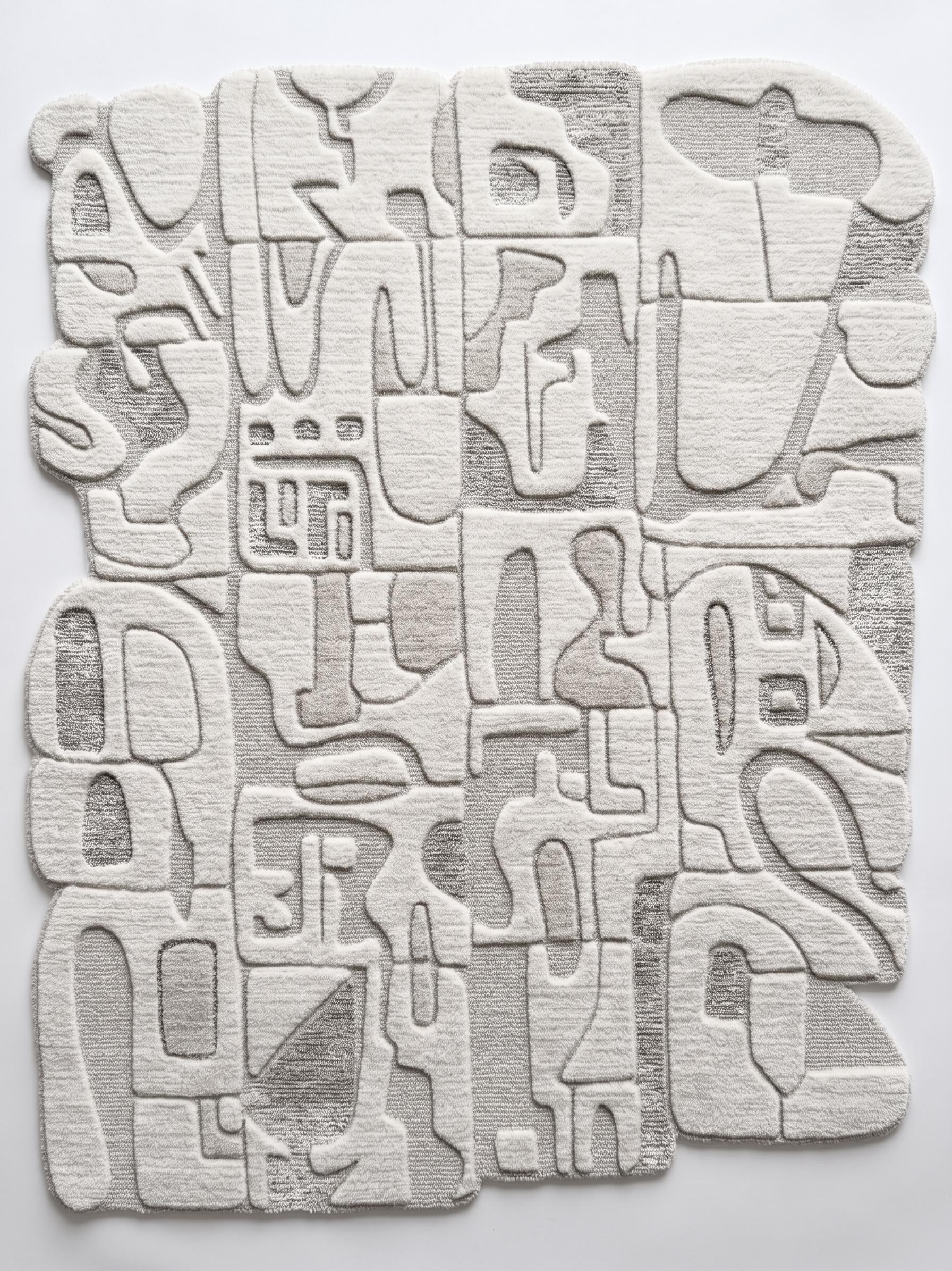 White rug with layered relief forms