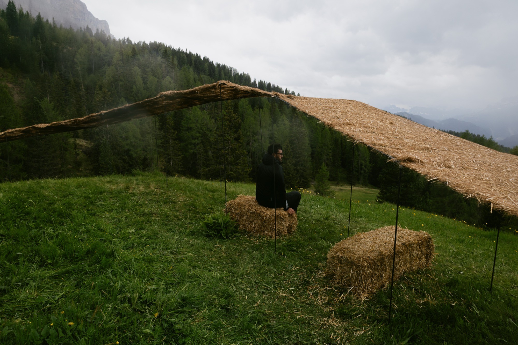 Trace of Land by ELSE, a meandering hay canopy across the Armentara meadows in Val Badia