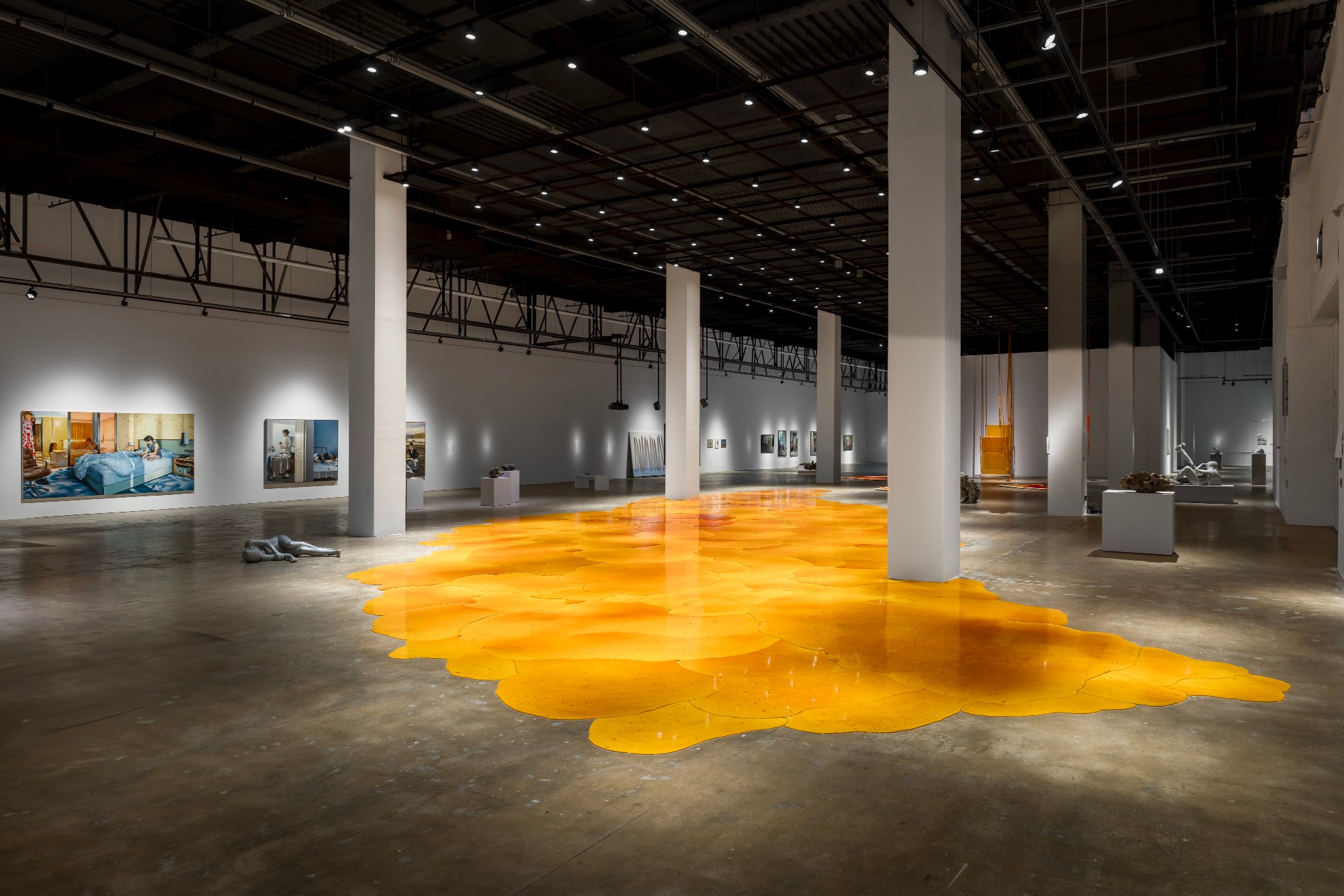 Gwangju Biennale Gallery 1 with an orange pool of material on the floor