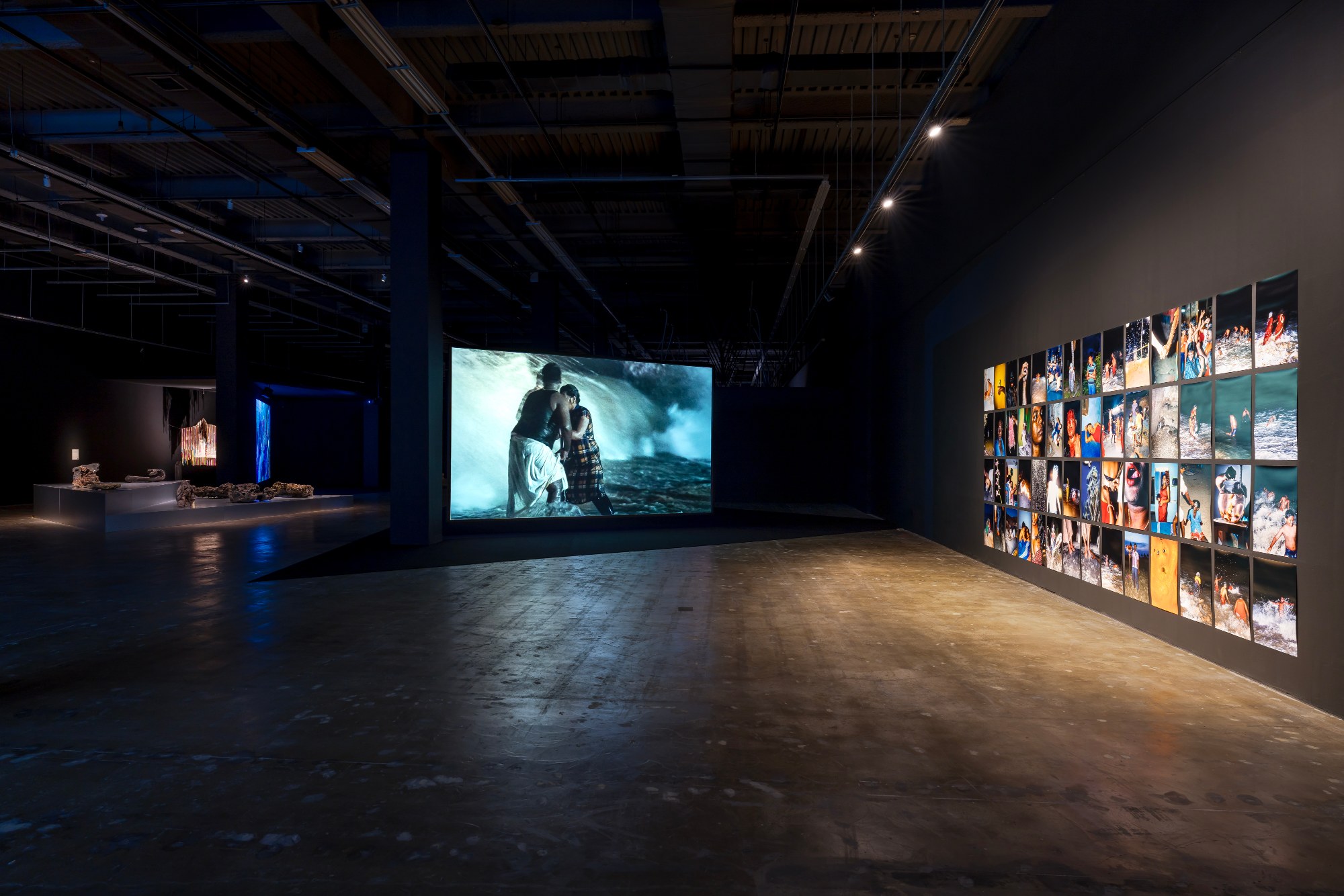 Gallery 4 in darkness with video projections