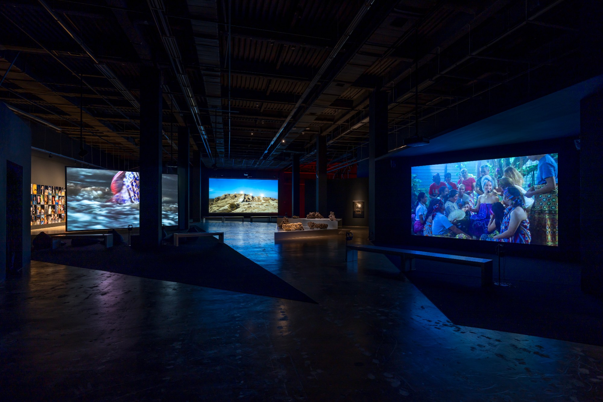 Gwangju Biennale Gallery 4 with several projected videos
