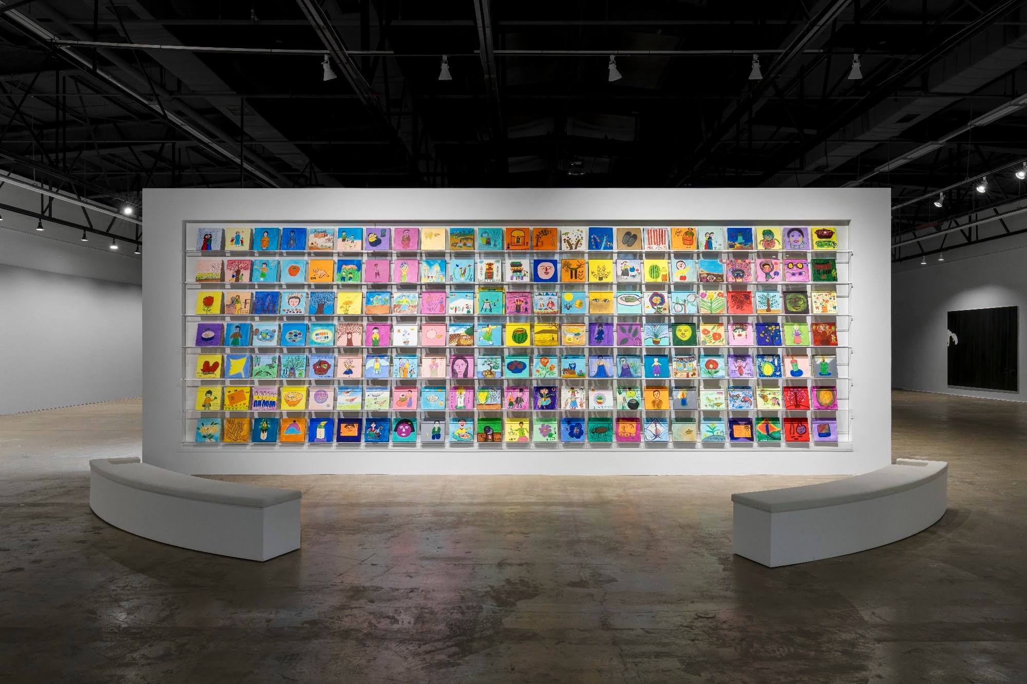 Wall of paintings by May Mothers House at the Gwangju Biennale