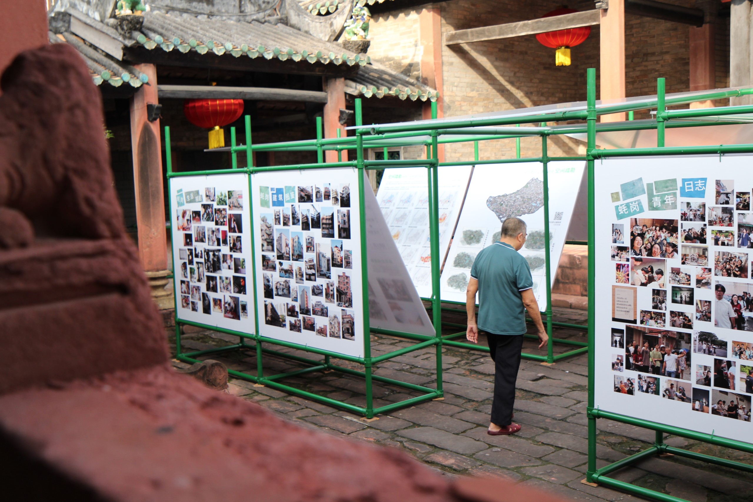 Villagers walking through the exhibition