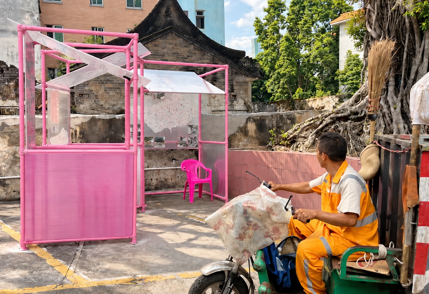 A sanitation worker looks toward the exhibition