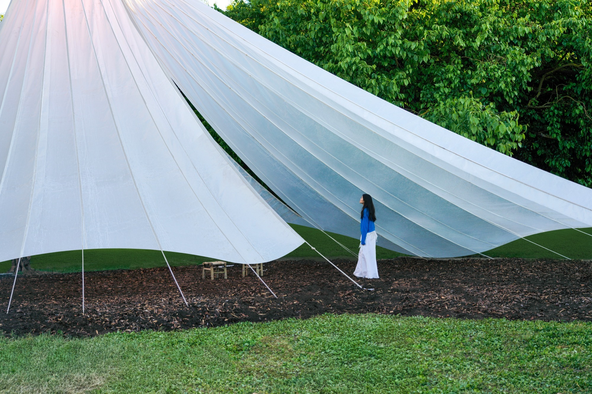 A visitor beside the canopy