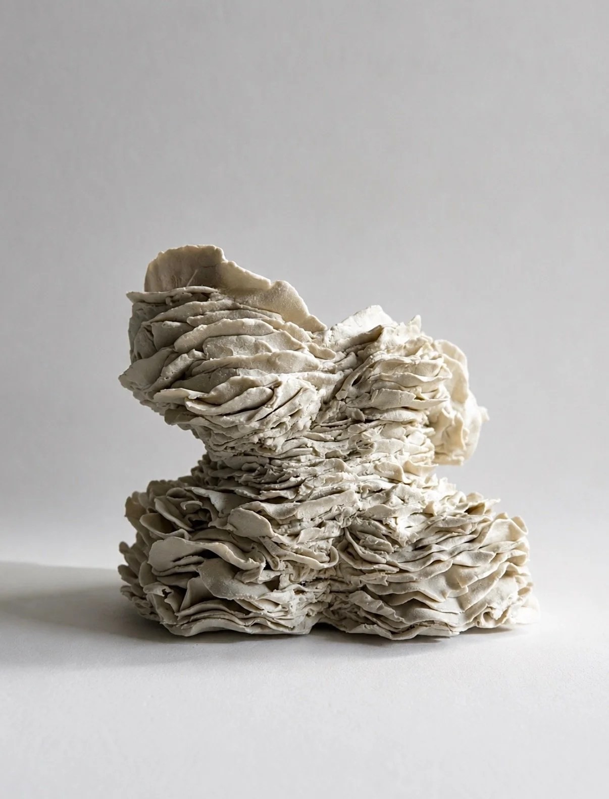 Moving between sculpture and function, each piece carries traces of touch, vulnerability and resistance, transforming the body into a quiet presence shaped by matter, time and intimacy.