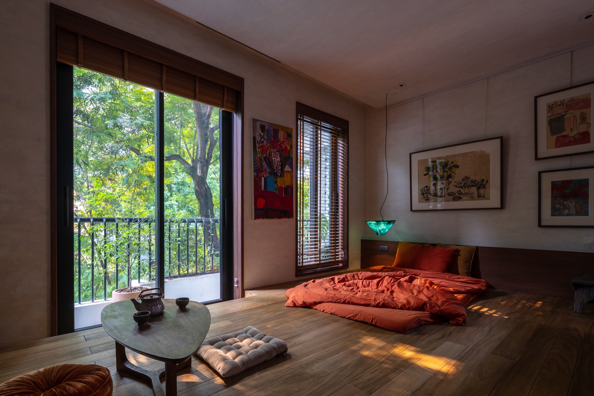The bed platform beside the balcony doors