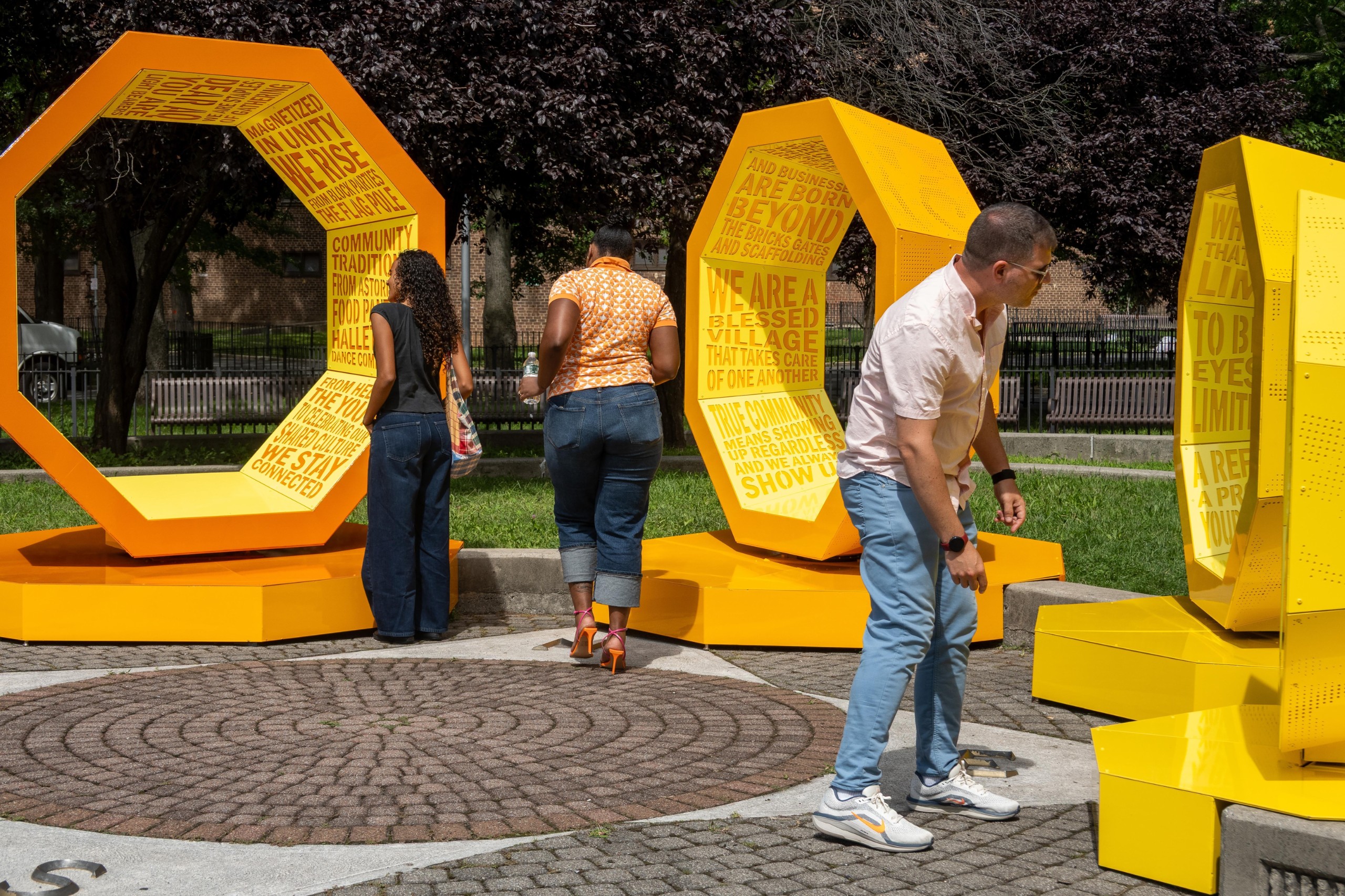 People standing among the rotated forms